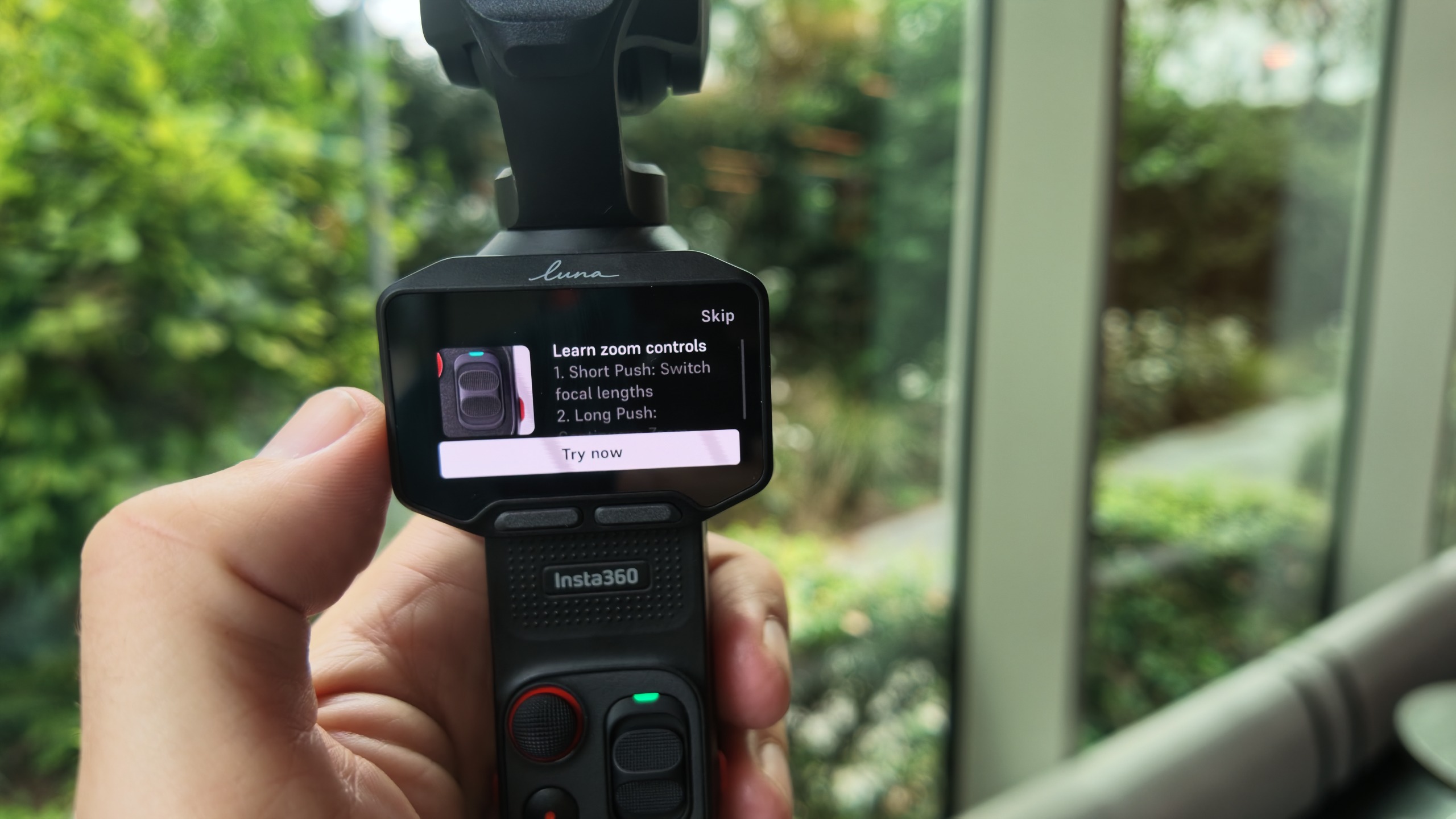 Insta360 Luna Pro in hand tutorial page on zoom