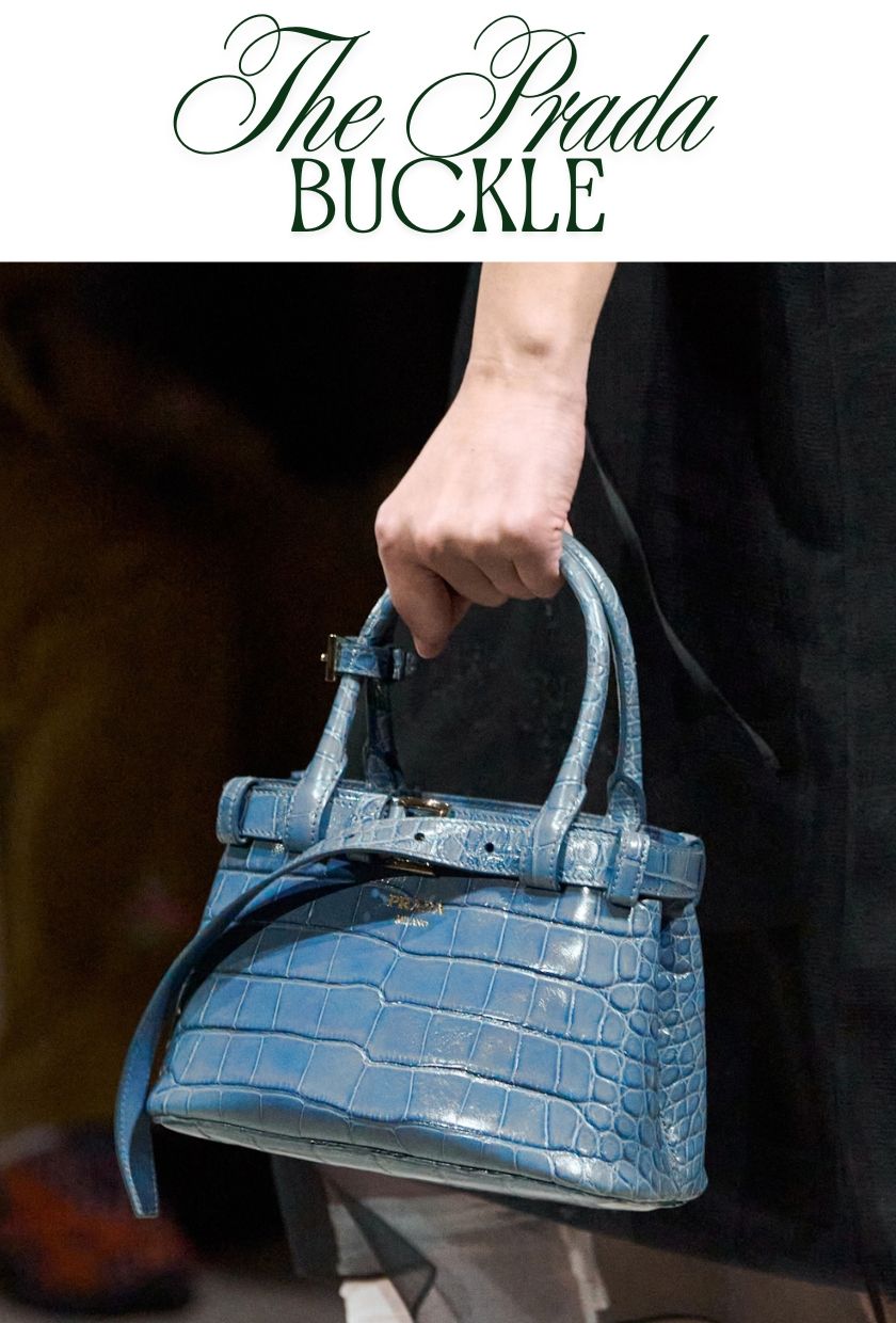 Autumn winter it bags 2026: Model carries a blue mock croc Prada buckle bag
