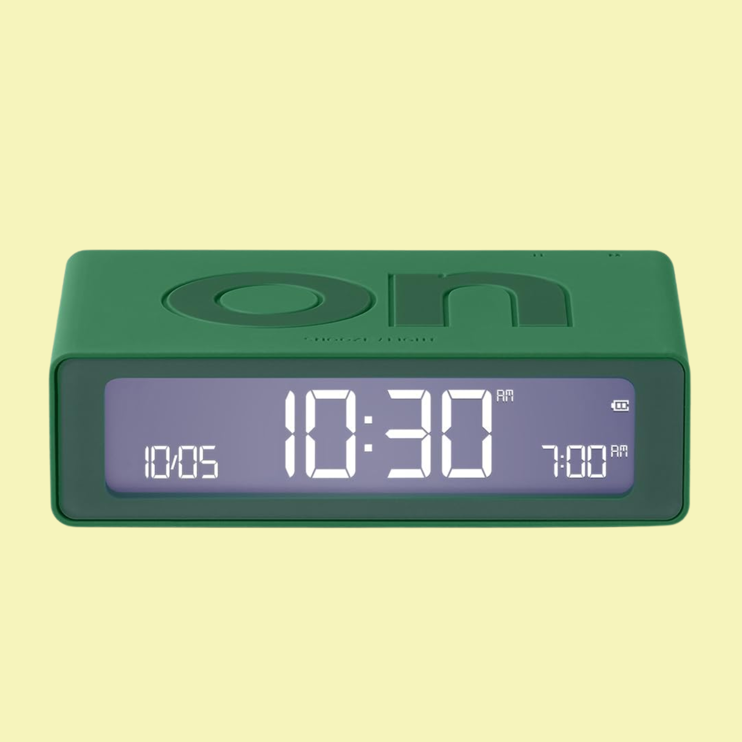 A green alarm clock