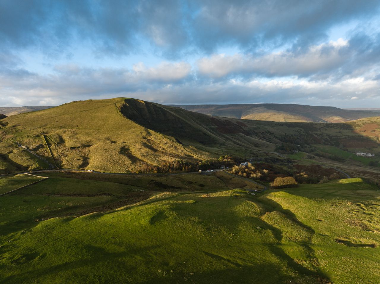 Image taken by James Abbott using the DJI Mavic 3 Classic. Here we see an overhead shot of a grassy hillside.