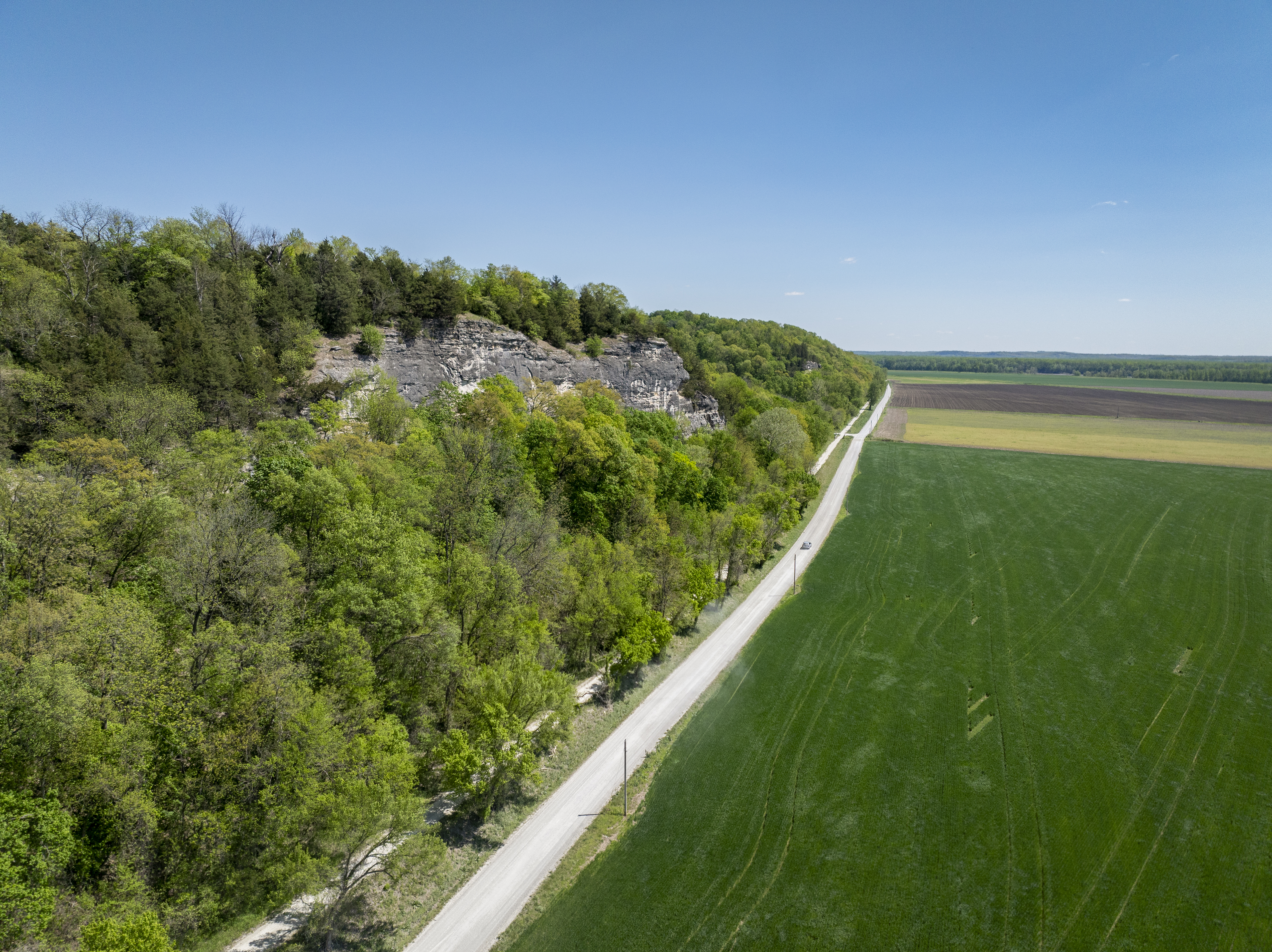 The Katy Trail goes through a green field in Missouri