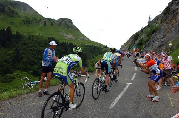 Vincenzo Nibali (Liquigas) and Lance Armstrong (Astana) follow Bradley Wiggins (Garmin-Slipstream).