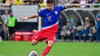 Christian Pulisic #10 of the United States strikes the ball during the first half against Brazil ahead of USA vs Bolivia