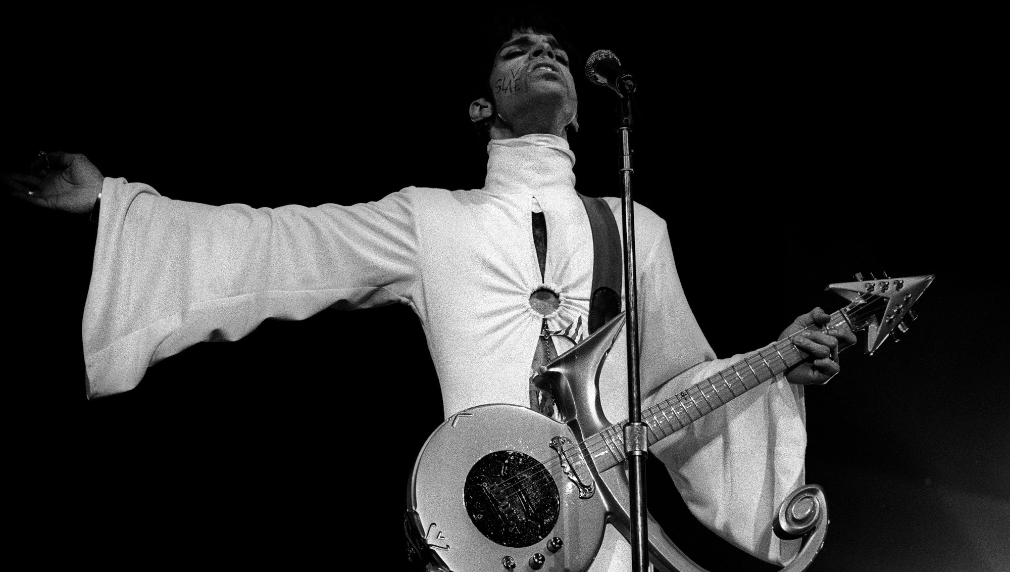 Prince performs onstage at the Brabathallen in Breda, the Netherlands on March 24, 1995