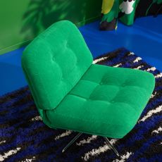 Green IKEA DYVLINGE armchair on monochrome rug