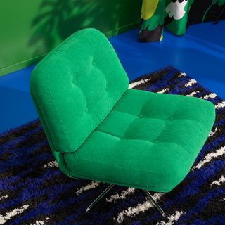 Green IKEA DYVLINGE armchair on monochrome rug