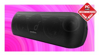 An Anker Soundcore Motion+ Bluetooth speaker on a pink deals background