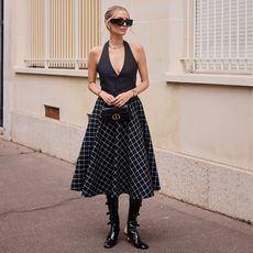 woman in a dress at paris fashion week