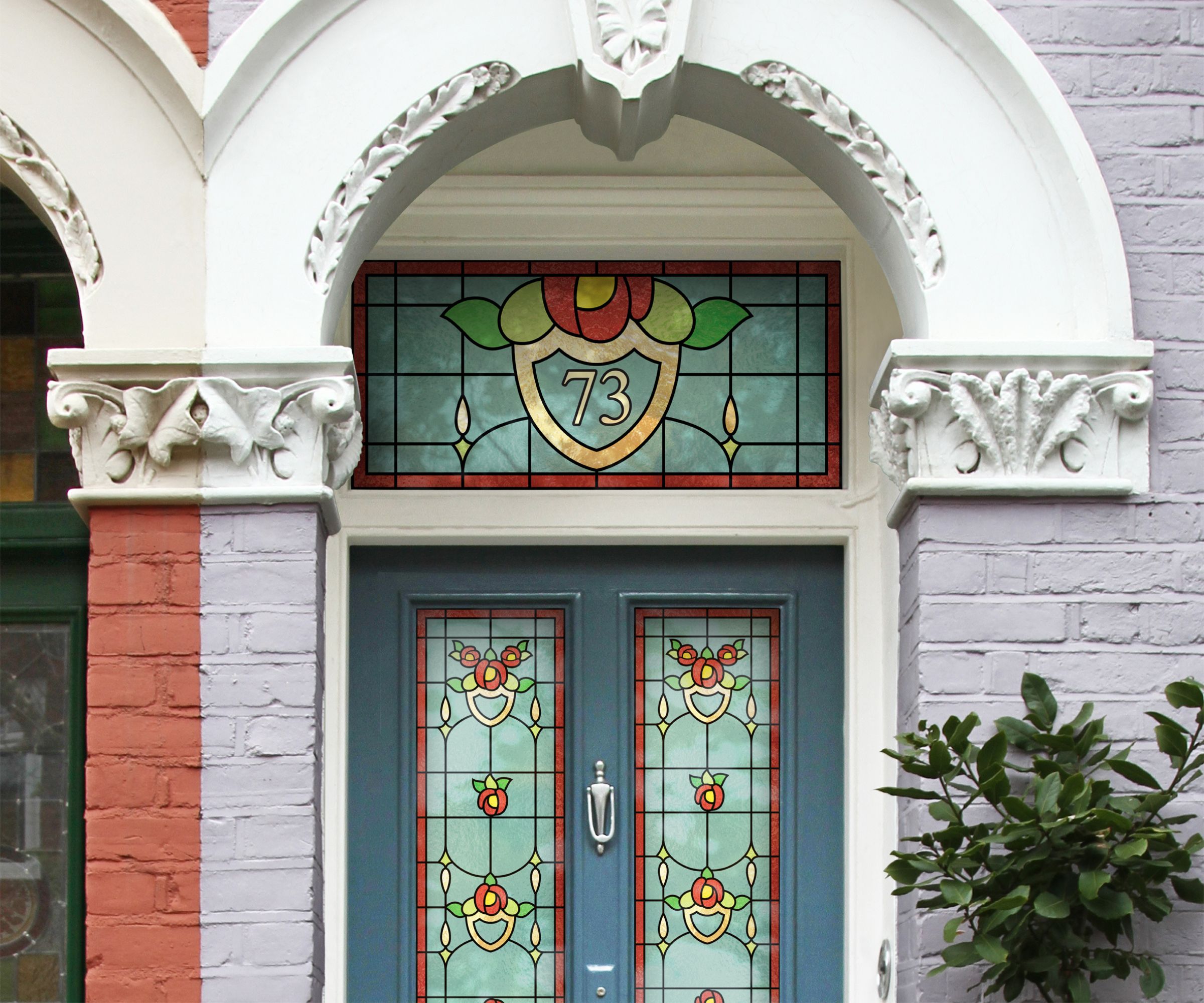 Victorian-style front door with colourful stained glass panels and arched detailing, creating a bold, characterful entrance with number 73.