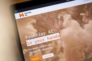 Mistral AI website featuring logo and branding displayed on a laptop screen.