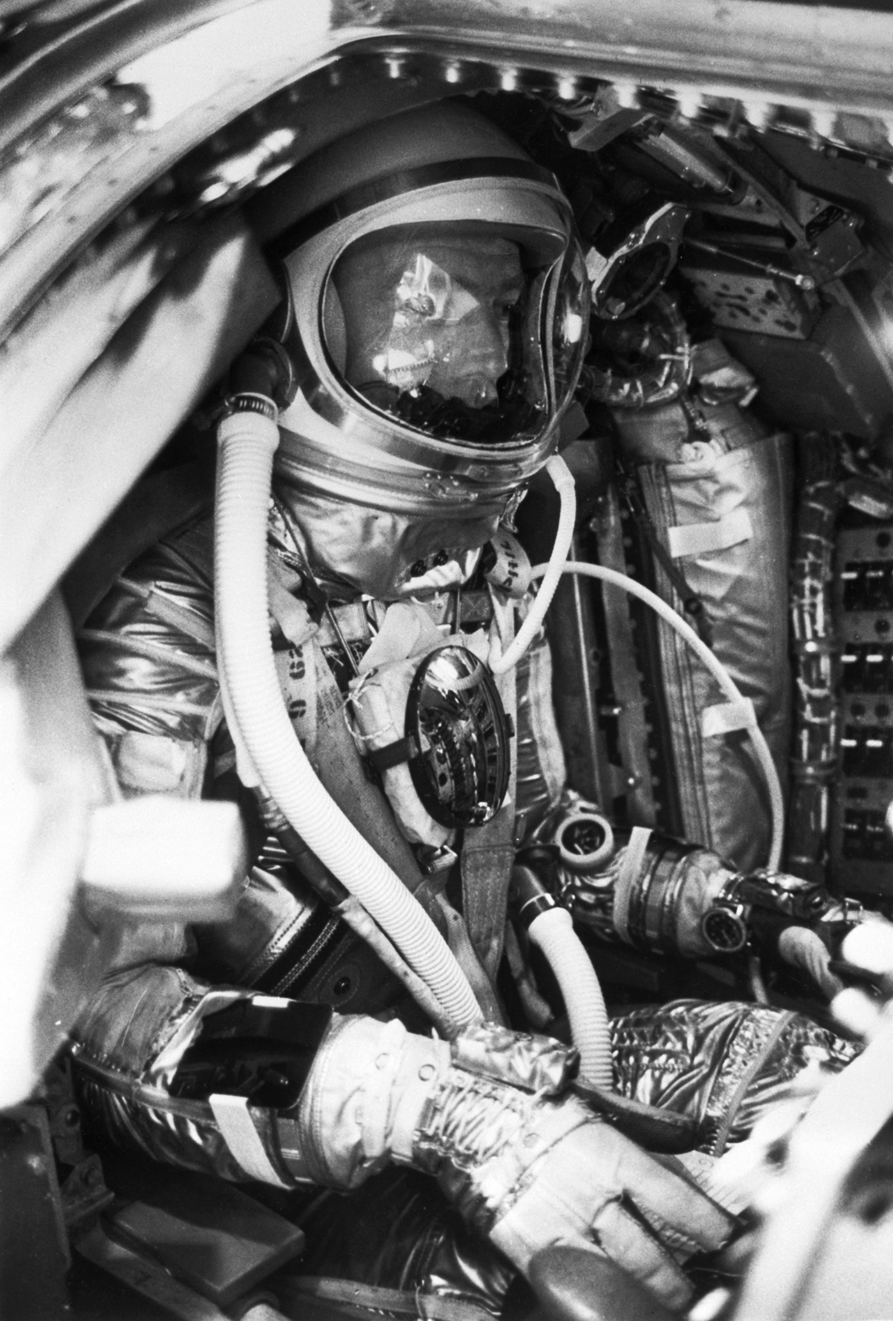 Pre-launch photo showing astronaut Scott Carpenter suited up and wearing his Navitimer Cosmonaute while on board 