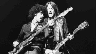 Thin Lizzy’s Phil Lynott and Scott Gorham performing onstage in the 1970s