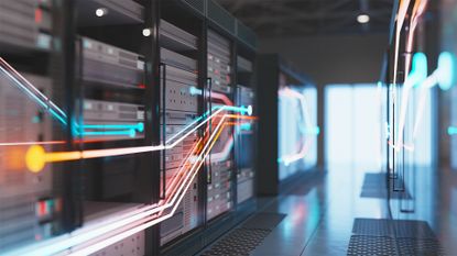 Supercomputer concept image showing server room with open racks and multi-colored data flows running across room.