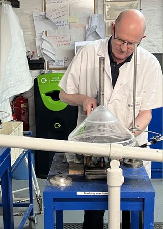 The crystal in the marking department. A cutter creates detailed lines for marking to help with accuracy when cutting takes place.