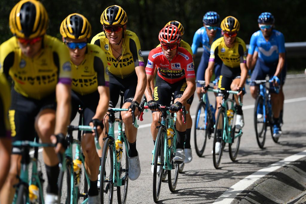 Primoz Roglic (Jumbo-Visma) rides in the peloton surrounded by his teammates