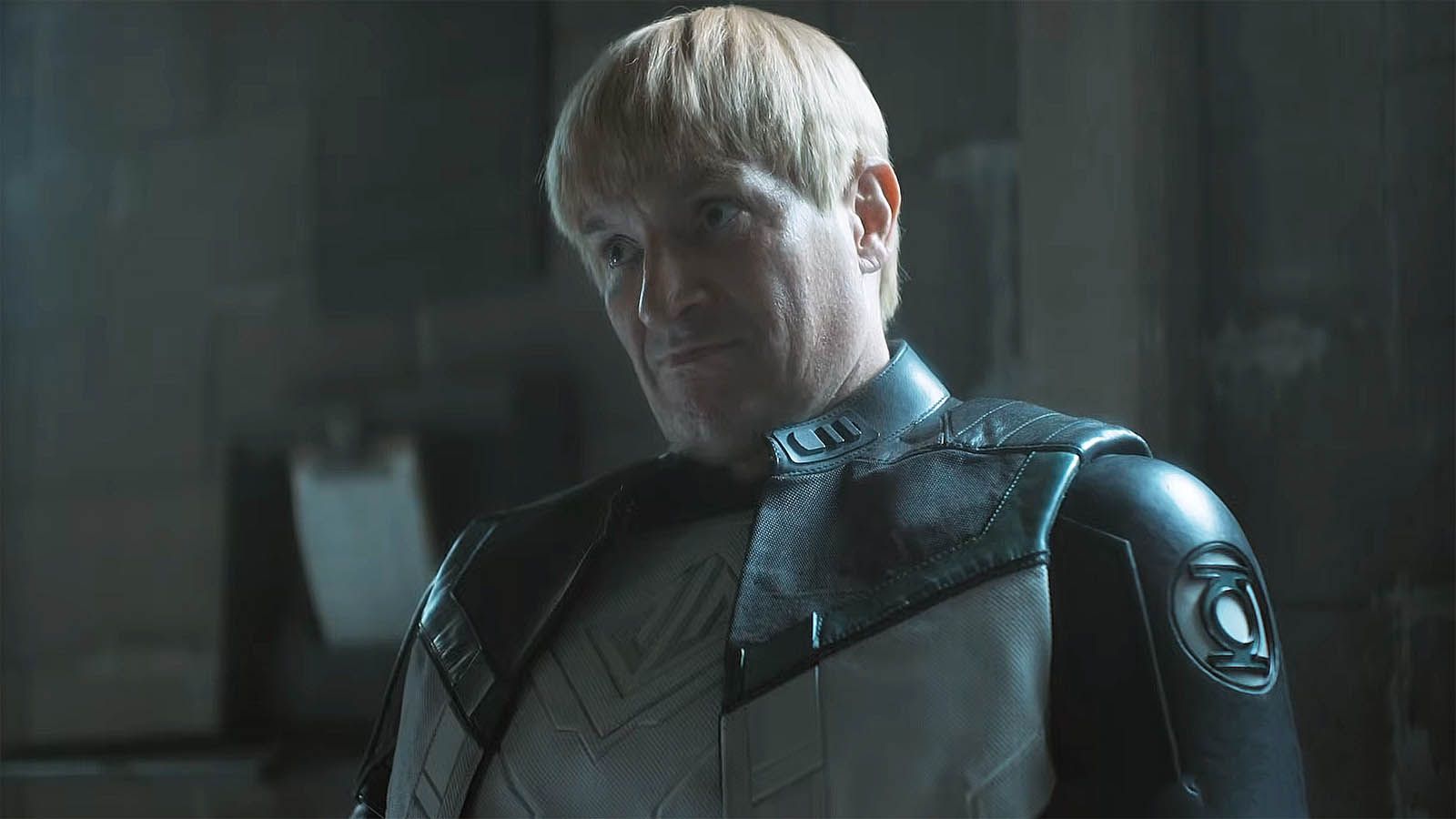 Nathan Fillion's Guy Gardner sitting on a chair in Lanterns episode 6