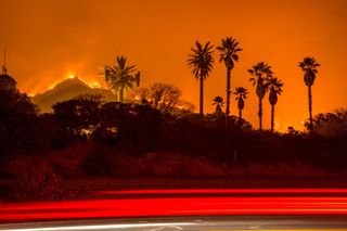 The Thomas Fire burns along a hillside near Santa Paula, California, on Dec. 5, 2017. 