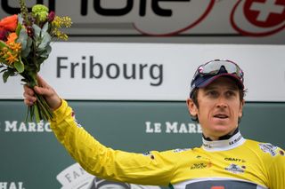 Britains Geraint Thomas celebrates with his yellow jersey of overall leader during the podium ceremony of the final stage 161 km race against the clock Fribourg to Fribourg during the Tour de Romandie UCI World Tour 2021 cycling race on May 2 2021 in Fribourg Photo by Fabrice COFFRINI AFP Photo by FABRICE COFFRINIAFP via Getty Images