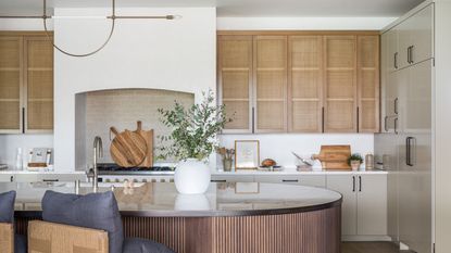  things in your kitchen cabinets to get rid of; Modern farmhouse neutral style kicthen with rattan kitchen cabinets by Lindye Galloway