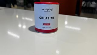 Food Spring creatine pot on white surface
