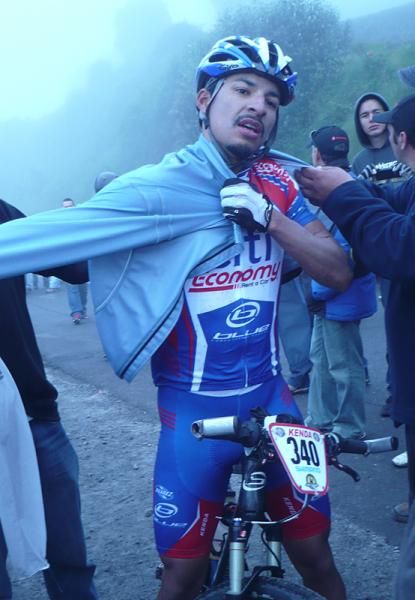 Federico Ramirez puts on a jacket at the summit of today's big climb.