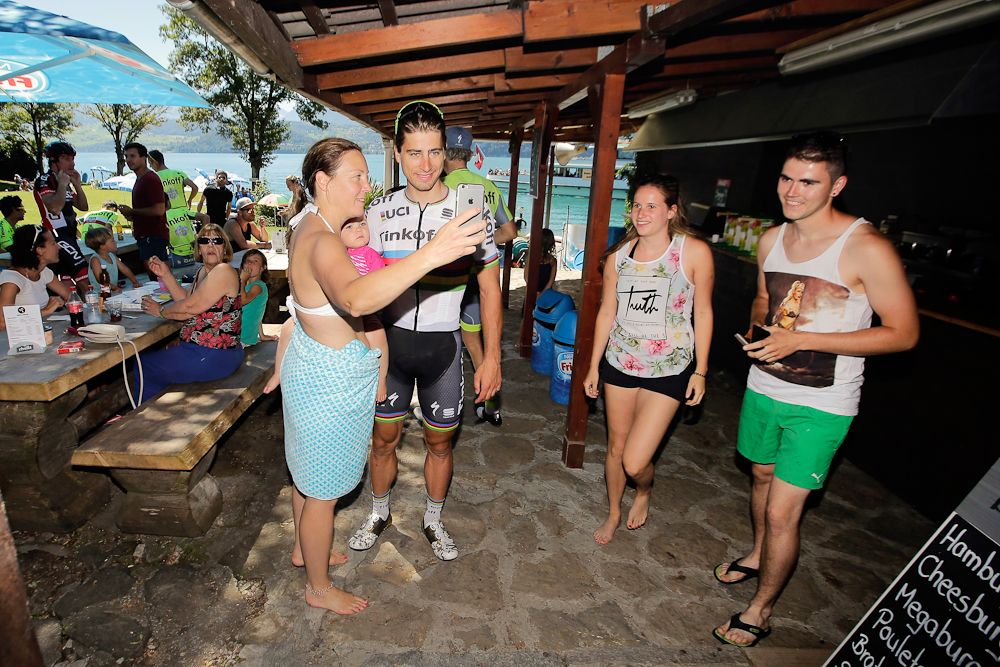 Popular Peter Sagan poses for photos with fans during the Tour's second rest day