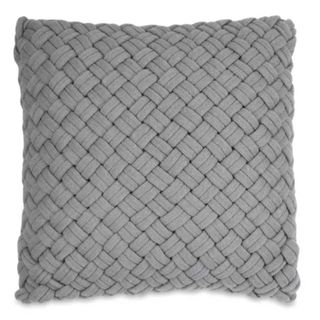 grey woven cushion to make a bedroom cosy