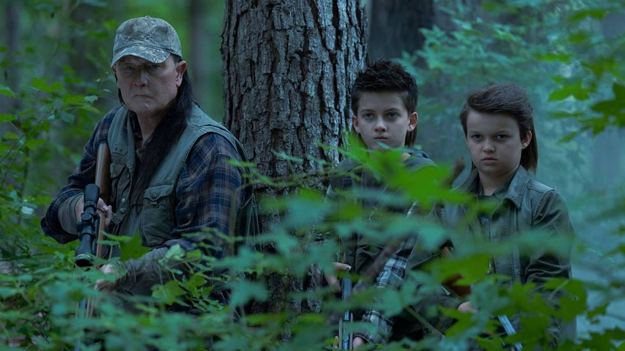 Auggie, Keith, and Chris hunting in a forest in Peacemaker season 2 episode 4