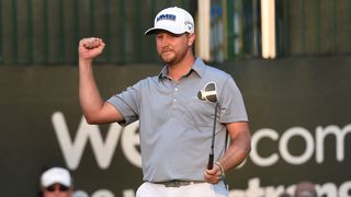 Brice Garnett celebrates winning the WinCo Foods Portland Open