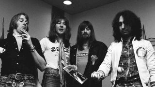 Bad Company pulling faces backstage at a gig in 1975