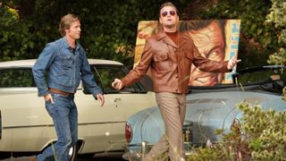 Once Upon A Time… In Hollywood still – Brad Pitt and Leonardo DiCaprio in front of cars