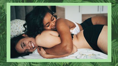Can you use cannabis for sex? Pictured: Happy lesbian couple in the bed