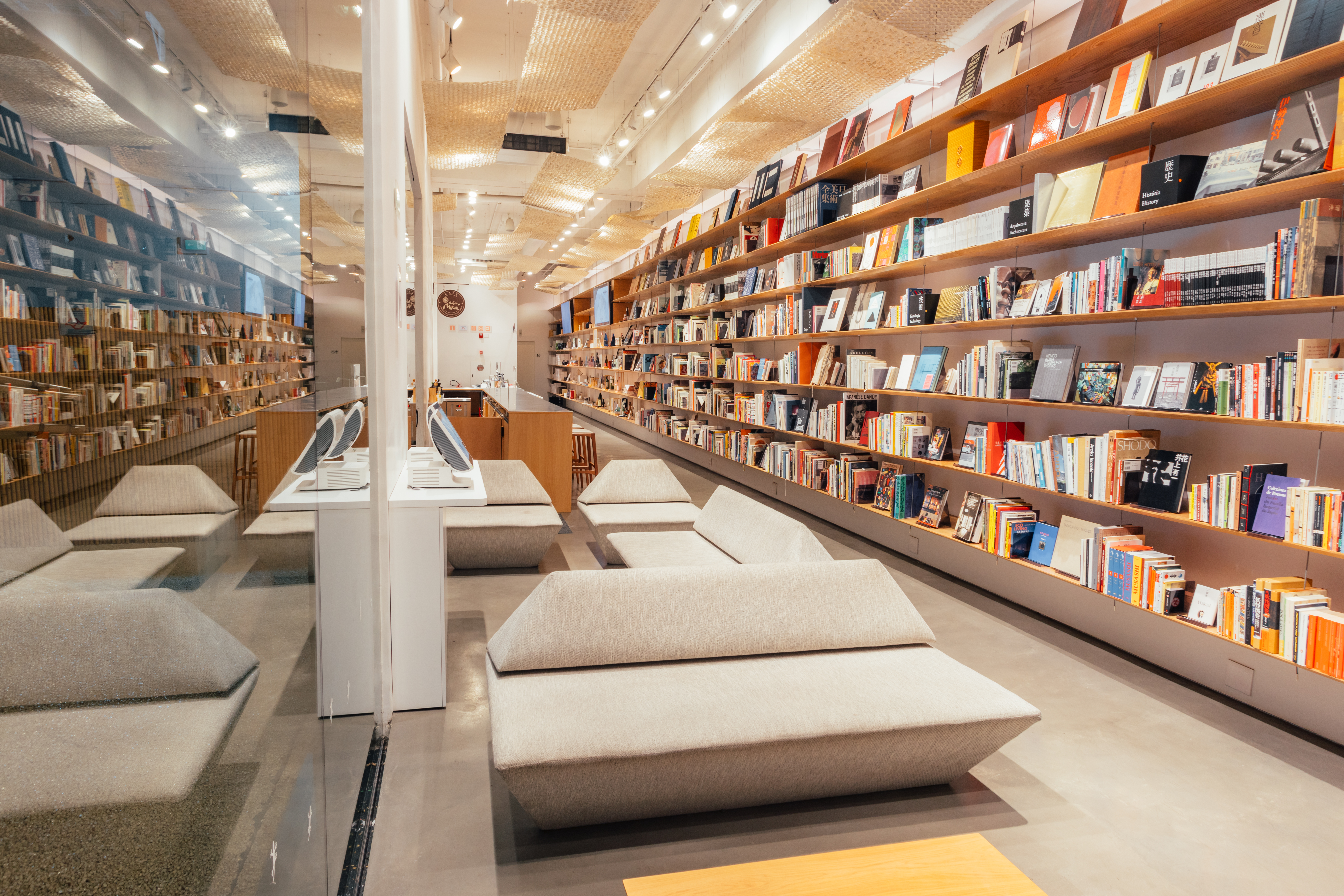 A sophisticatedly decorated museum boasts a wooden facade of interlaced cuts and a stylish, minimalist library.