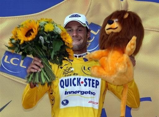 Tom Boonen (Quick.Step) celebrates with the yellow jersey