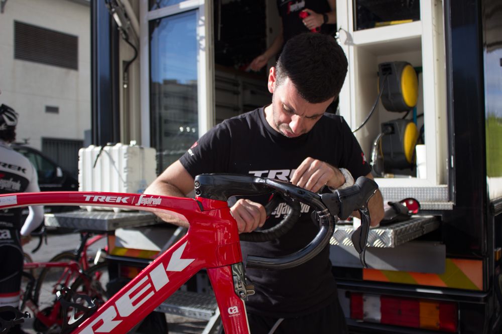The team mechanics work around the clock to prepare the Trek bikes