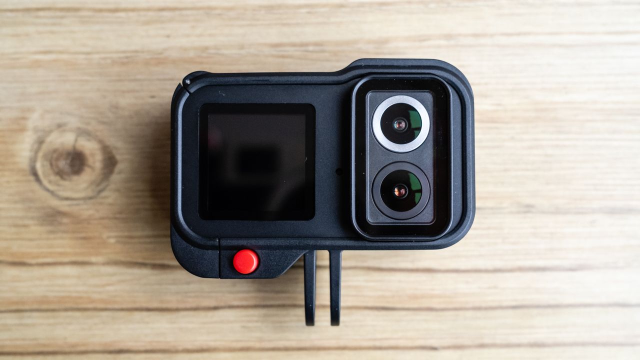 SJCAM SJ20 action camera on a wooden floor
