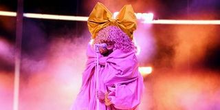 Sia performing on stage.