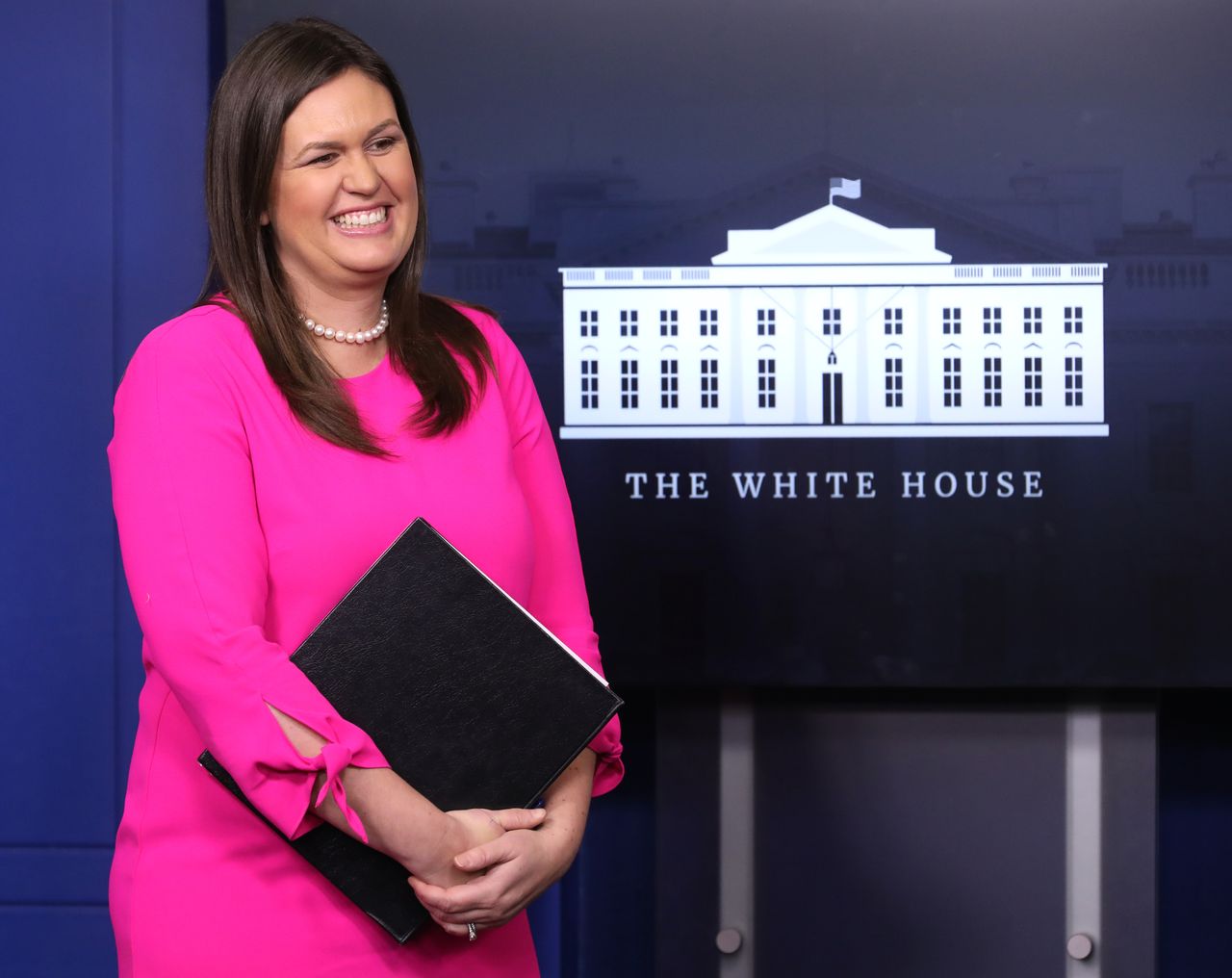 Sarah Huckabee Sanders at a news conference