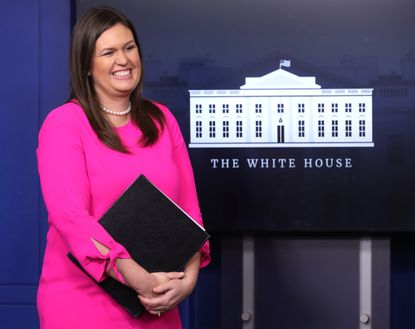 Sarah Huckabee Sanders at a news conference