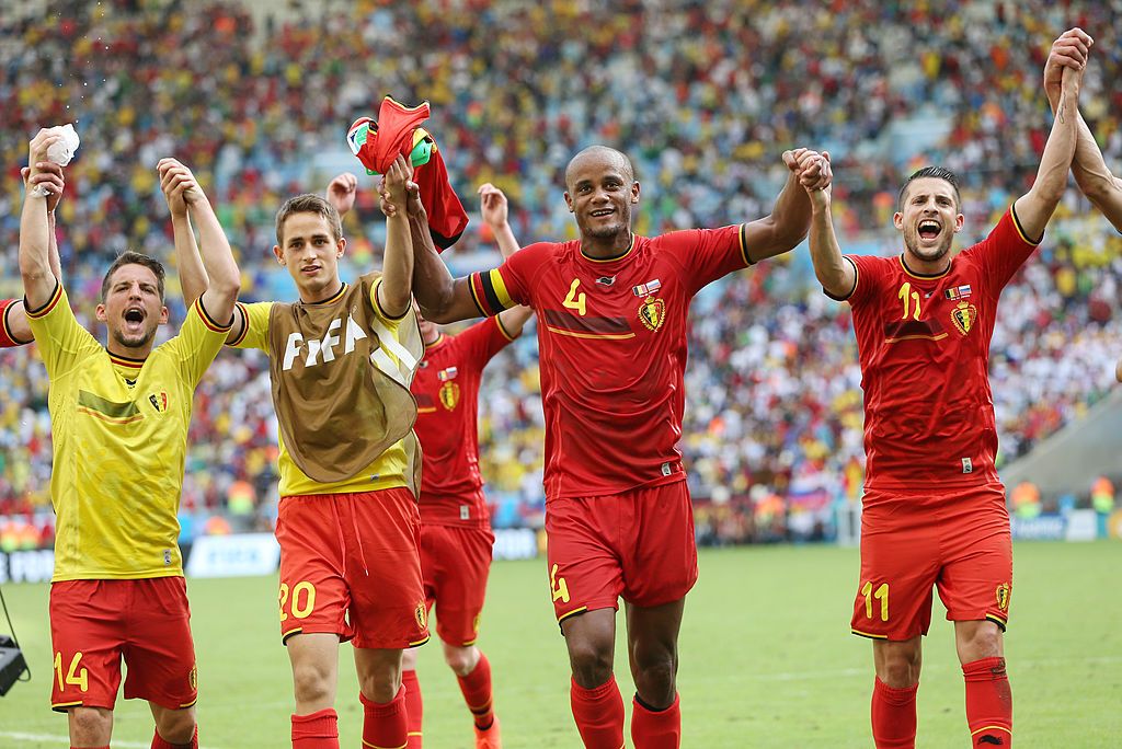 RIO DE JANEIRO, BRAZIL - JUNE 22: Dries Mertens, Adnan Januzaj, Vincent Kompany, Kevin Mirallas of Belgium celebrates their victory over Russia during the Group H, 2014 World Cup match between Belgium and Russia at The Maracana Stadium on June 22, 2014 in Rio de Janeiro, Brazil. (Photo by Ian MacNicol/Getty Images)