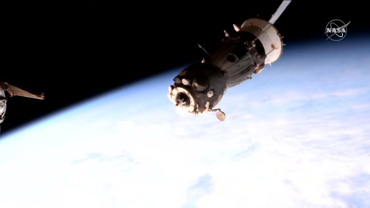 A Russian Soyuz MS-22 spacecraft is seen after undocking from the International Space Station with a bright blue Earth in the background on March 28, 2023. The Soyuz suffered a coolant leak in December 2022 and returned to Earth without a crew.