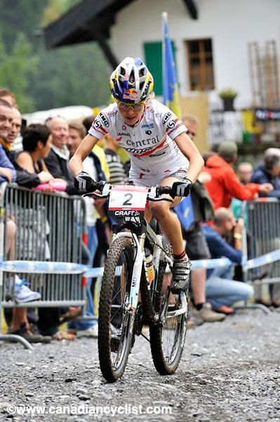 Elisabeth Osl took the lead late on lap one.