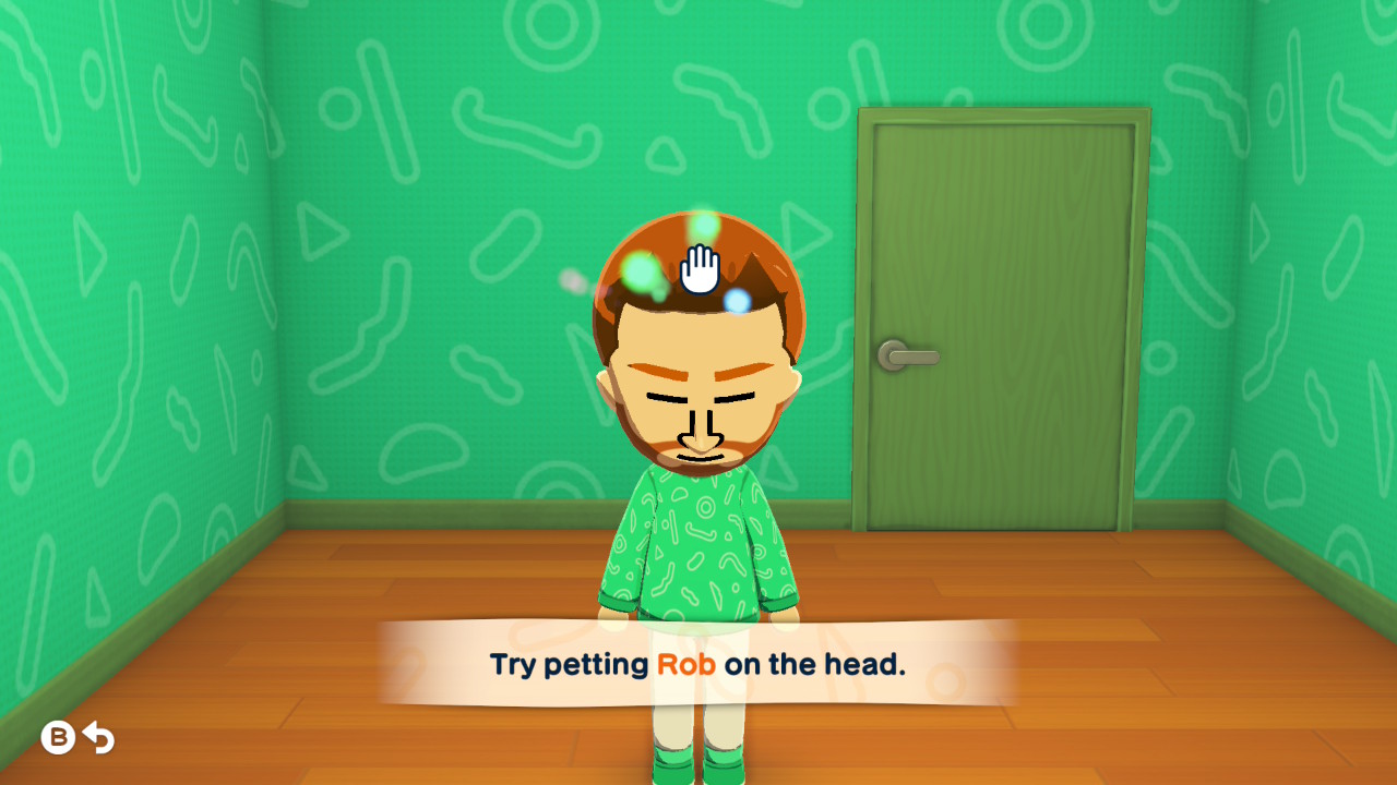 A Tomodachi Life: Living the Dream screenshot taken on Nintendo Switch 2 showing Rob about to have his head patted.