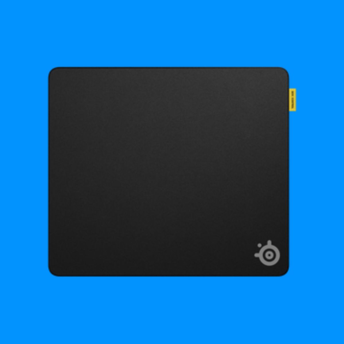 A SteelSeries QCK mouse pad on a blue background