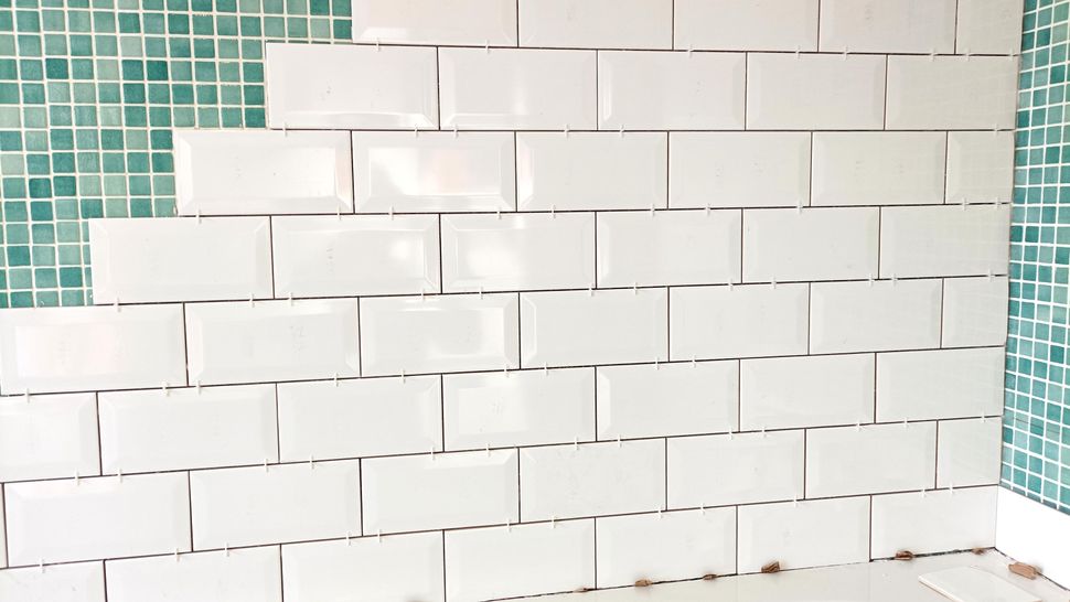 Can you tile over tiles? What are the pros and cons Homebuilding