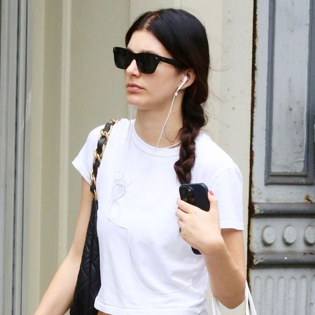 Camila Morrone wearing a white T-shirt