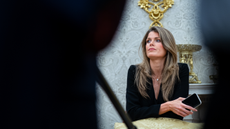 Lindsey Halligan, attorney for US President Donald Trump, during an executive order signing in the Oval Office of the White House in Washington, DC, US, on Monday, March 31, 2025. The order directs the Federal Trade Commission to work with the Department of Justice to ensure that competition laws are enforced in the concert and entertainment industry, and pushes state consumer protection authorities on enforcement. Photographer: Al Drago/Bloomberg via Getty Images