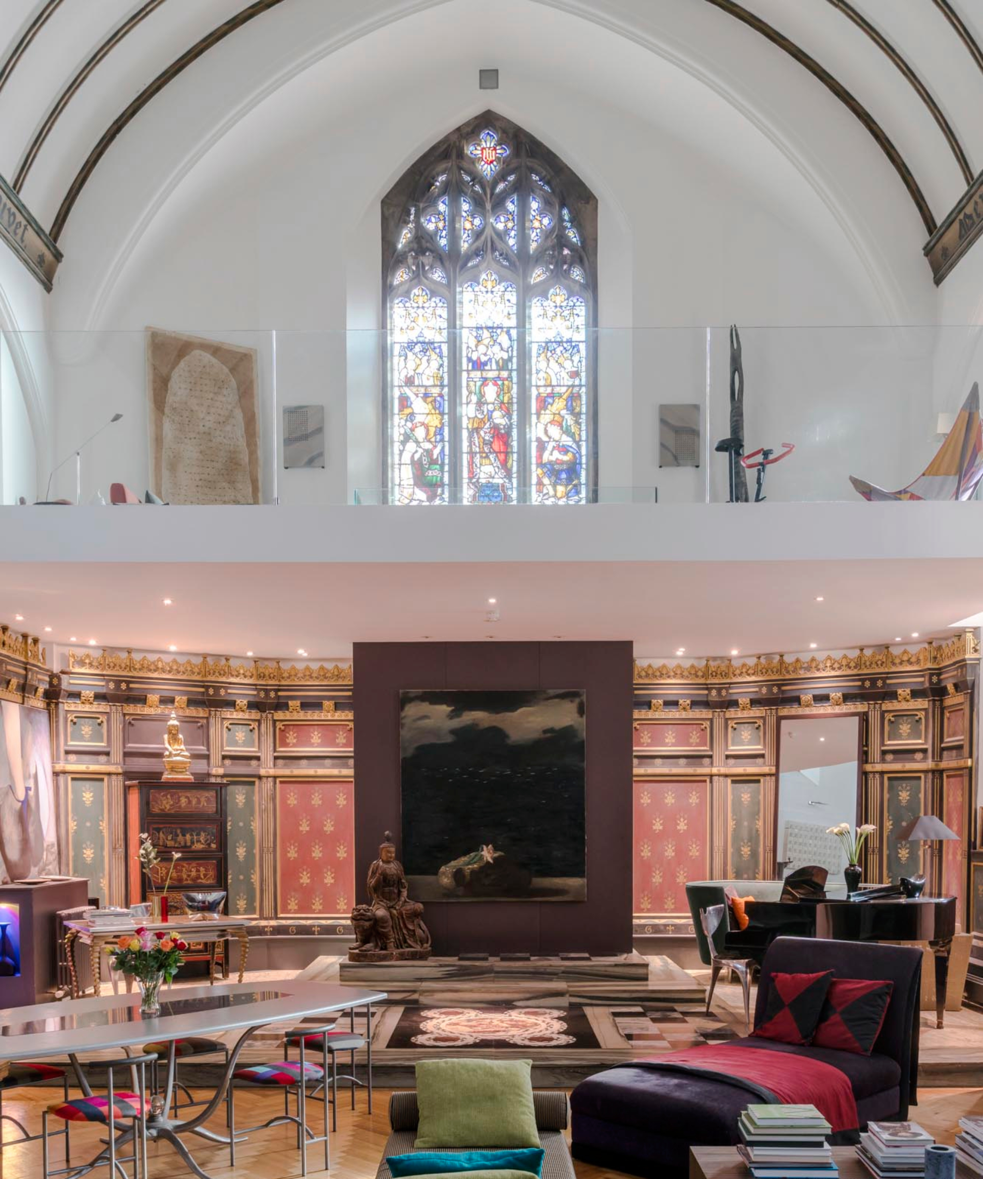 inside of chapel conversion showing stained glass window