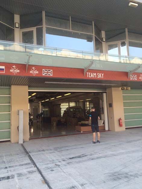 Team Sky inspect their pit garage
