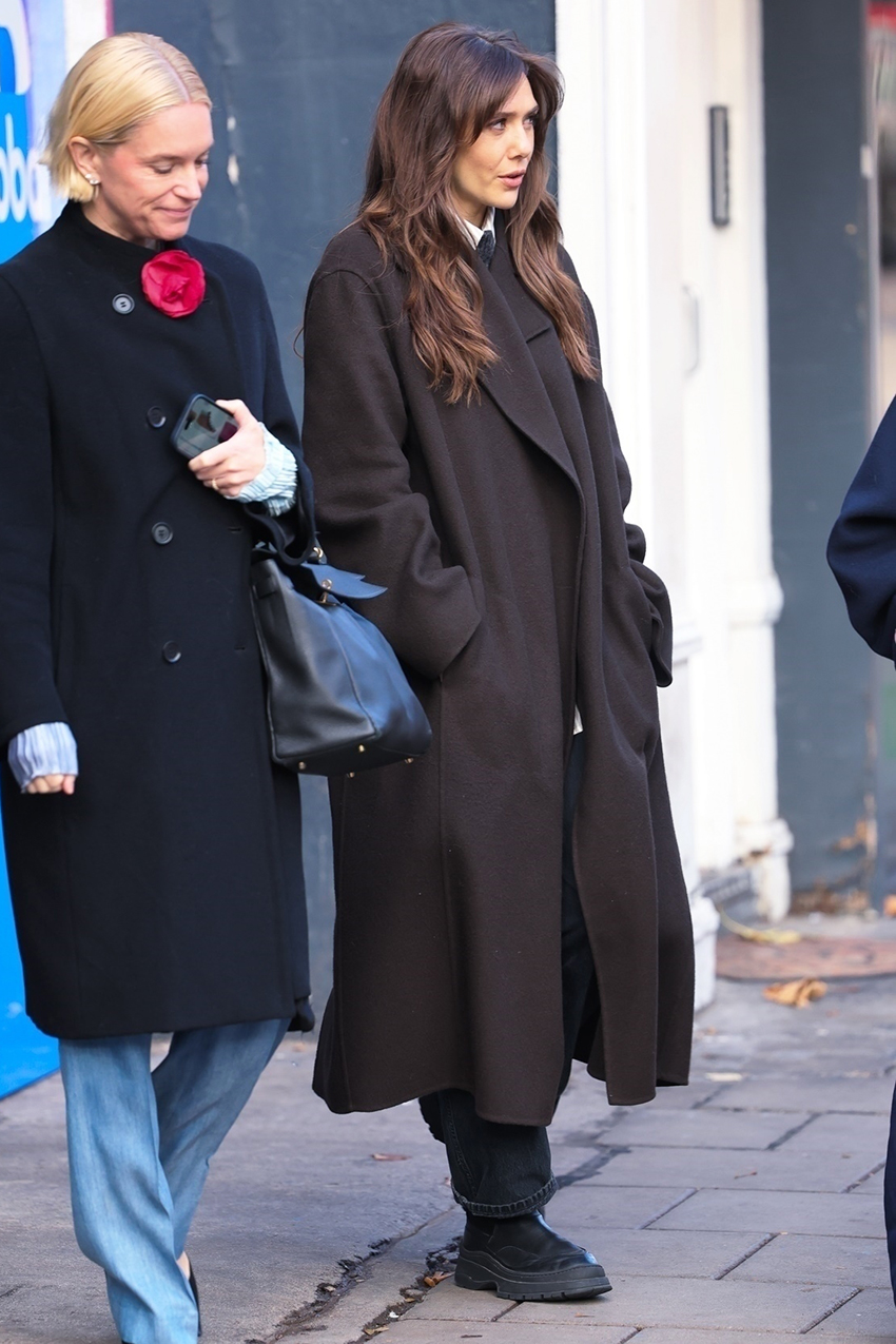 Elizabeth Olsen wearing an oversized brown wool coat